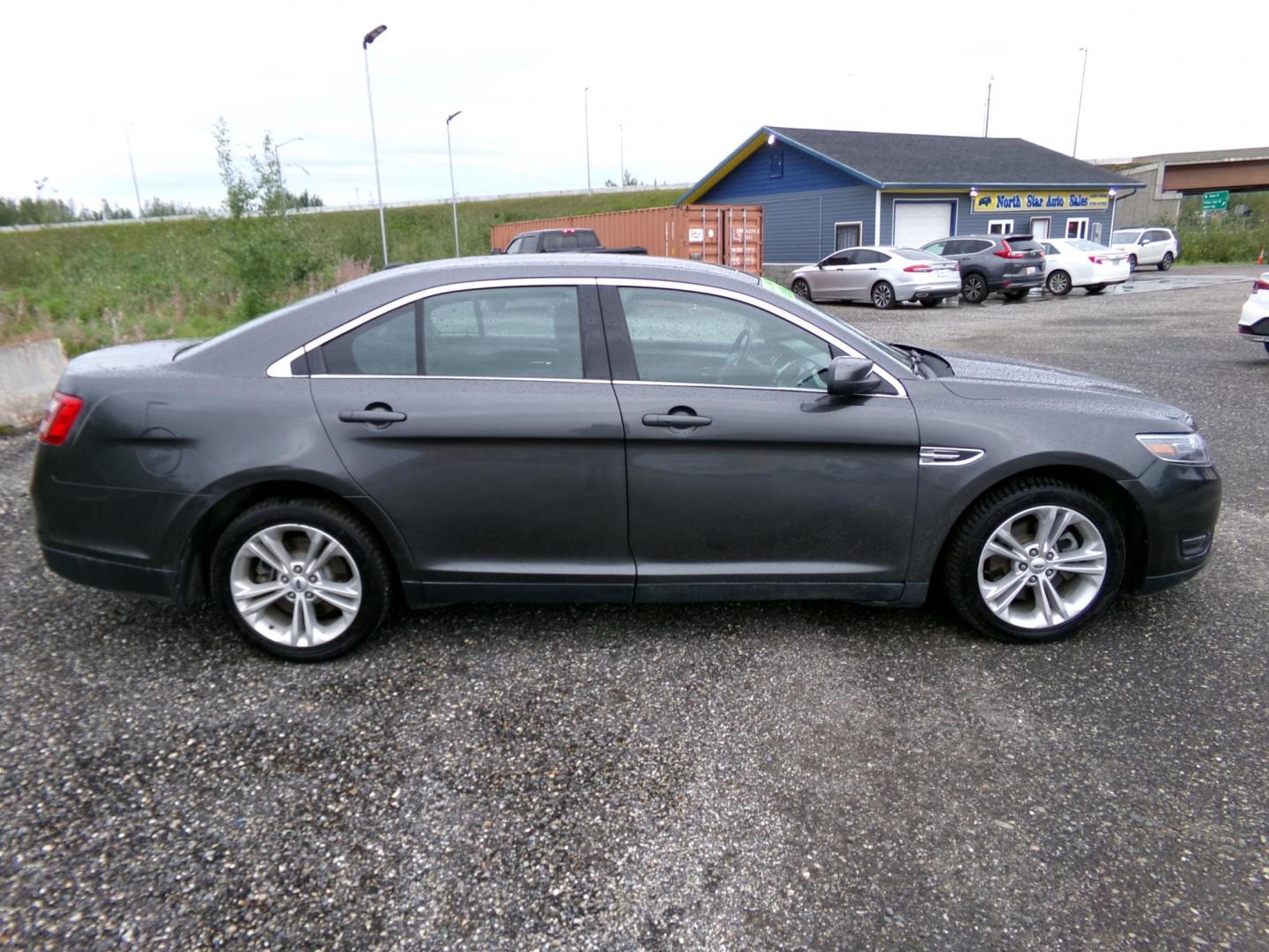 2015 /Grey Ford Taurus SEL AWD (1FAHP2H89FG) with an 3.5L V6 DOHC 24V engine, 6-Speed Automatic transmission, located at 2630 Philips Field Rd., Fairbanks, AK, 99709, (907) 458-0593, 64.848068, -147.780609 - Photo#2