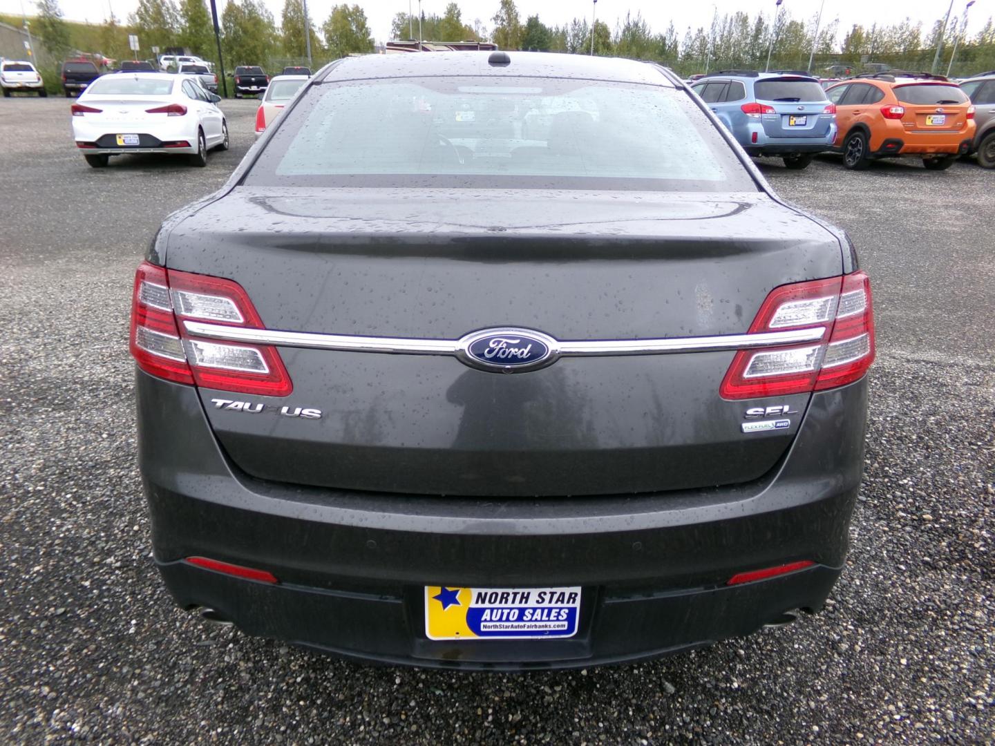 2015 /Grey Ford Taurus SEL AWD (1FAHP2H89FG) with an 3.5L V6 DOHC 24V engine, 6-Speed Automatic transmission, located at 2630 Philips Field Rd., Fairbanks, AK, 99709, (907) 458-0593, 64.848068, -147.780609 - Photo#3