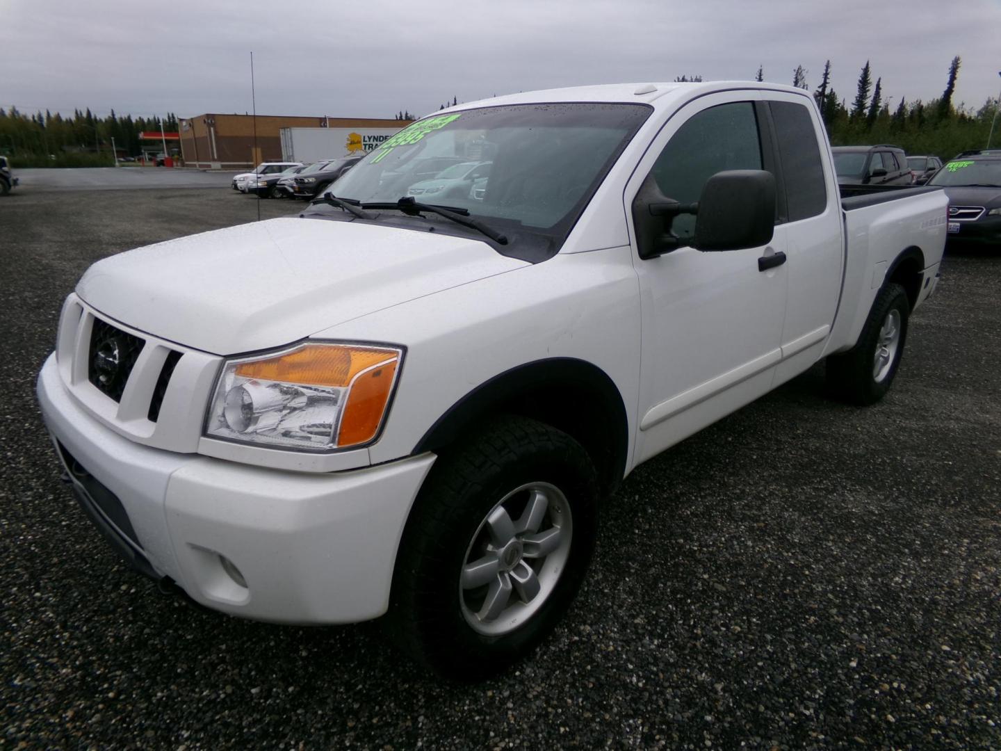 2011 Nissan Titan S King Cab 4WD (1N6AA0CCXBN) with an 5.6L V8 DOHC 32V engine, 5-Speed Automatic transmission, located at 2630 Philips Field Rd., Fairbanks, AK, 99709, (907) 458-0593, 64.848068, -147.780609 - Photo#0