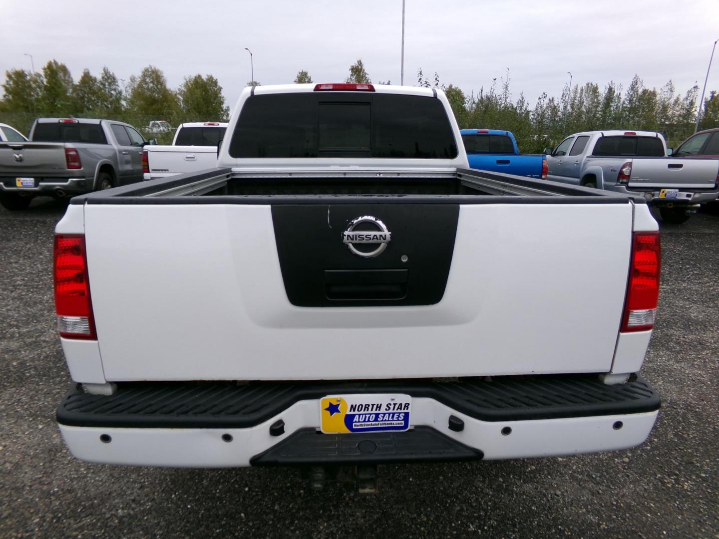 2011 Nissan Titan S King Cab 4WD (1N6AA0CCXBN) with an 5.6L V8 DOHC 32V engine, 5-Speed Automatic transmission, located at 2630 Philips Field Rd., Fairbanks, AK, 99709, (907) 458-0593, 64.848068, -147.780609 - Photo#2