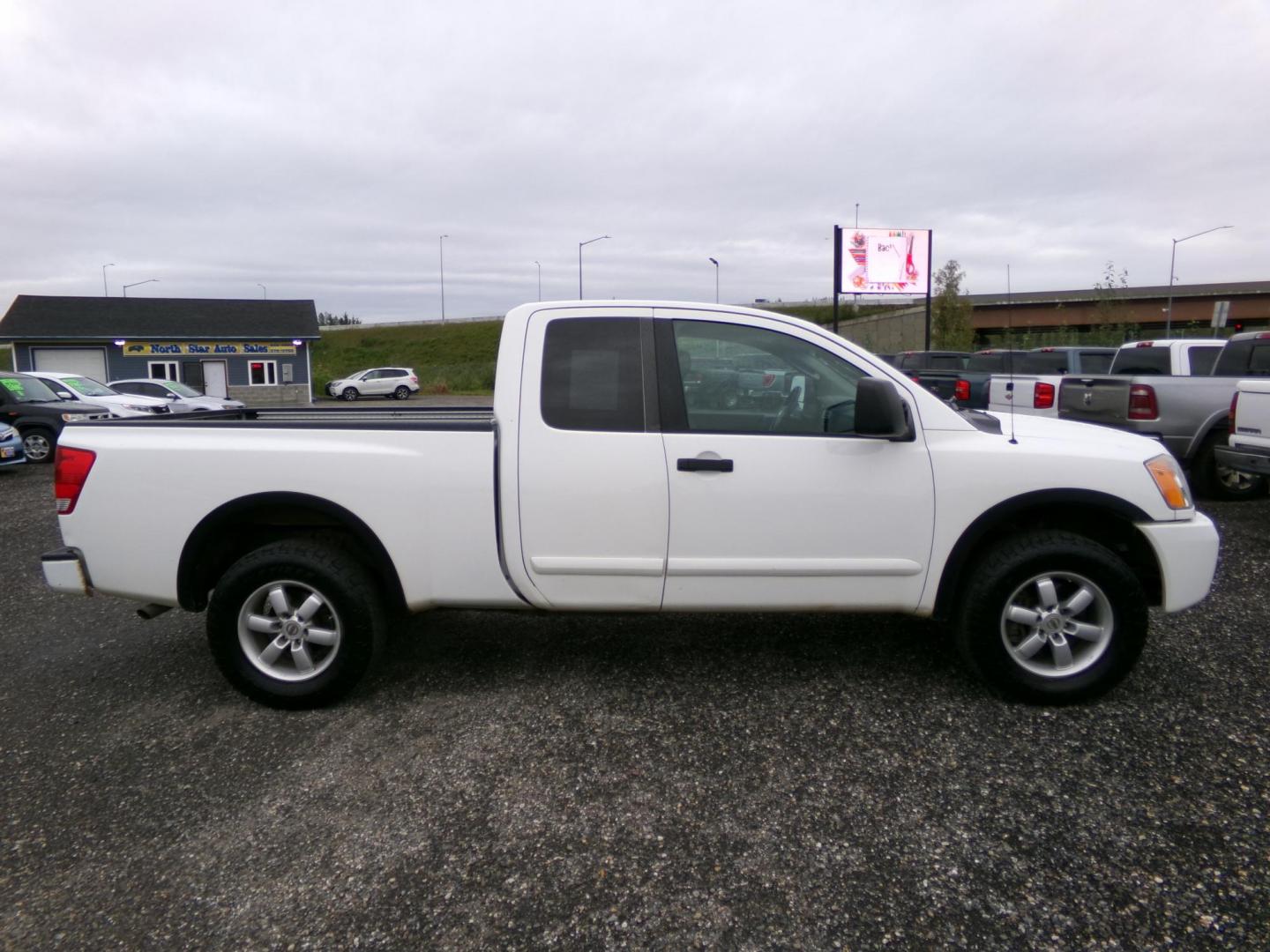 2011 Nissan Titan S King Cab 4WD (1N6AA0CCXBN) with an 5.6L V8 DOHC 32V engine, 5-Speed Automatic transmission, located at 2630 Philips Field Rd., Fairbanks, AK, 99709, (907) 458-0593, 64.848068, -147.780609 - Photo#3