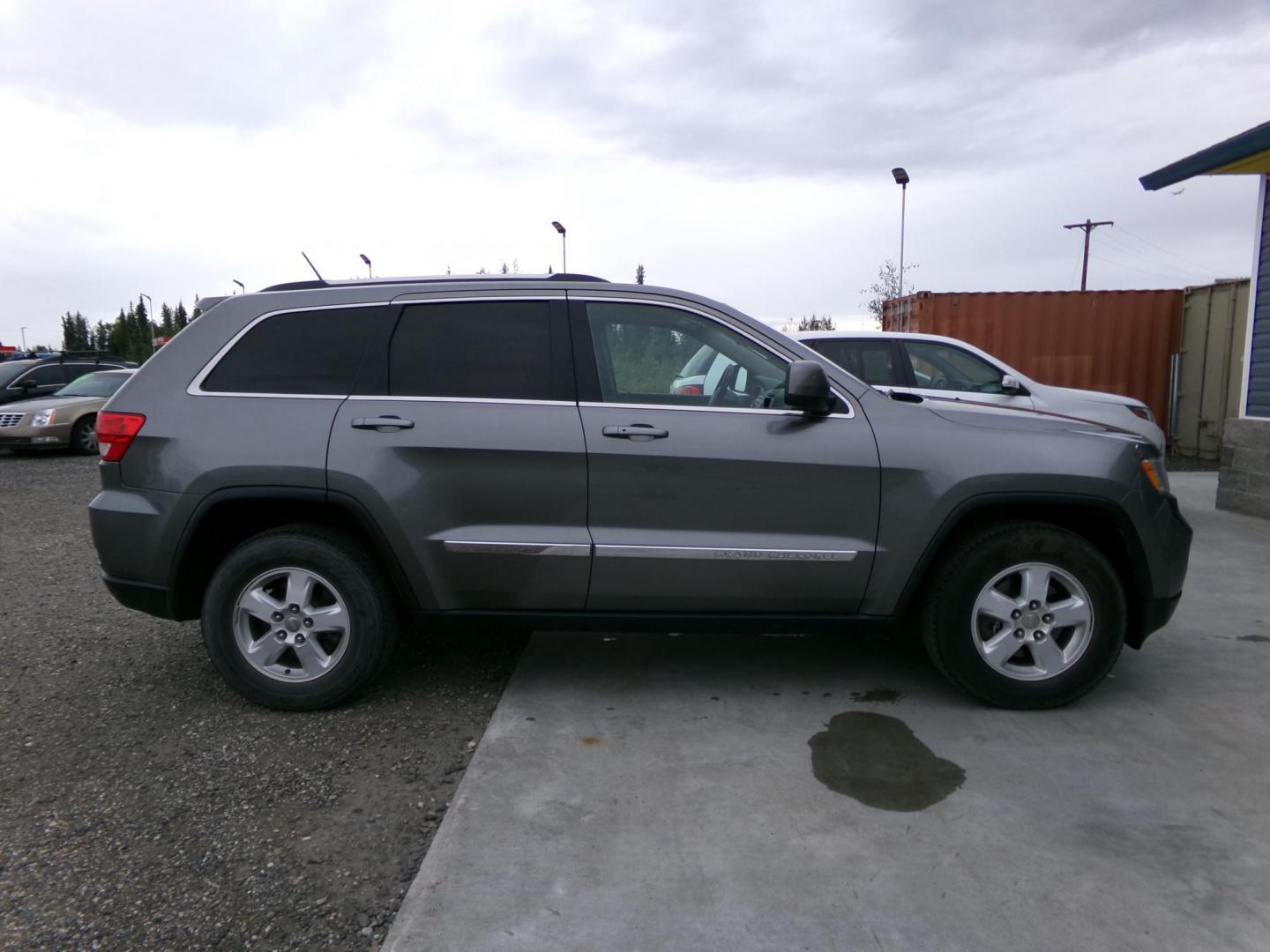 2012 /Black Jeep Grand Cherokee Laredo 4WD (1C4RJFAG8CC) with an 3.6L V6 DOHC 24V engine, 5-Speed Automatic transmission, located at 2630 Philips Field Rd., Fairbanks, AK, 99709, (907) 458-0593, 64.848068, -147.780609 - Photo#2