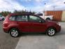 2016 Red Subaru Forester 2.5i Premium (JF2SJABC8GH) with an 2.5L H4 SOHC 16V engine, 6-Speed Automatic transmission, located at 2630 Philips Field Rd., Fairbanks, AK, 99709, (907) 458-0593, 64.848068, -147.780609 - Photo#2