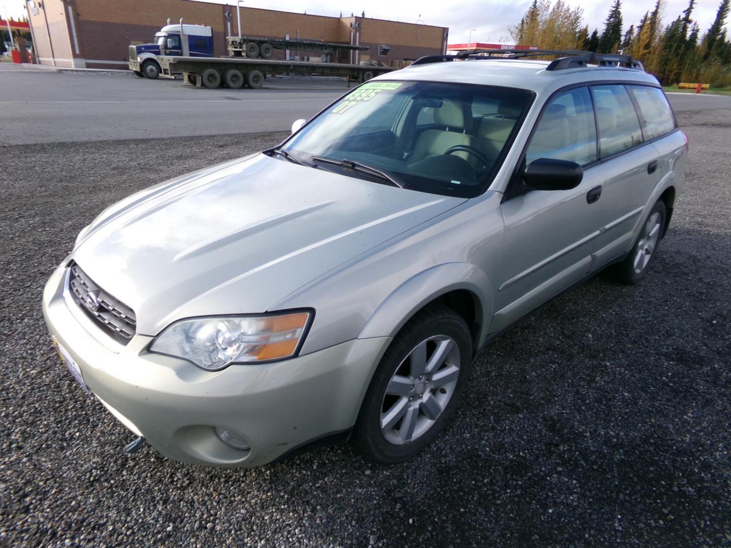 2007 Gold Subaru Outback 2.5i Basic Wagon (4S4BP61C377) with an 2.5L H4 SOHC 16V engine, 4-Speed Automatic Overdrive transmission, located at 2630 Philips Field Rd., Fairbanks, AK, 99709, (907) 458-0593, 64.848068, -147.780609 - Photo#0