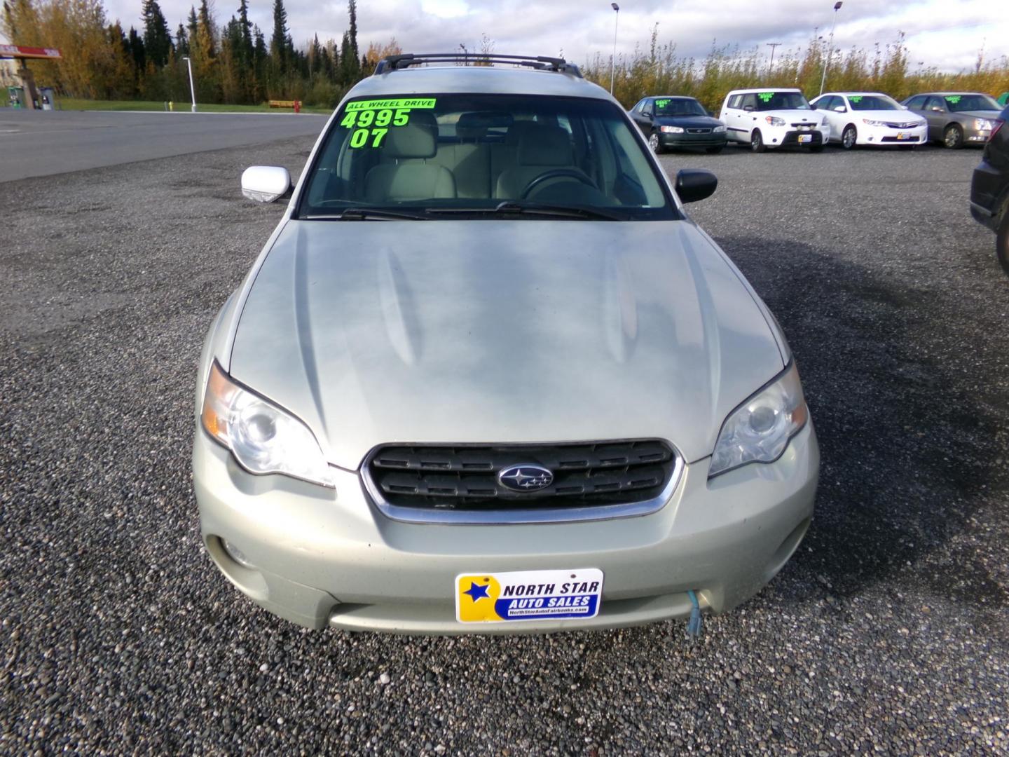 2007 Gold Subaru Outback 2.5i Basic Wagon (4S4BP61C377) with an 2.5L H4 SOHC 16V engine, 4-Speed Automatic Overdrive transmission, located at 2630 Philips Field Rd., Fairbanks, AK, 99709, (907) 458-0593, 64.848068, -147.780609 - Photo#1