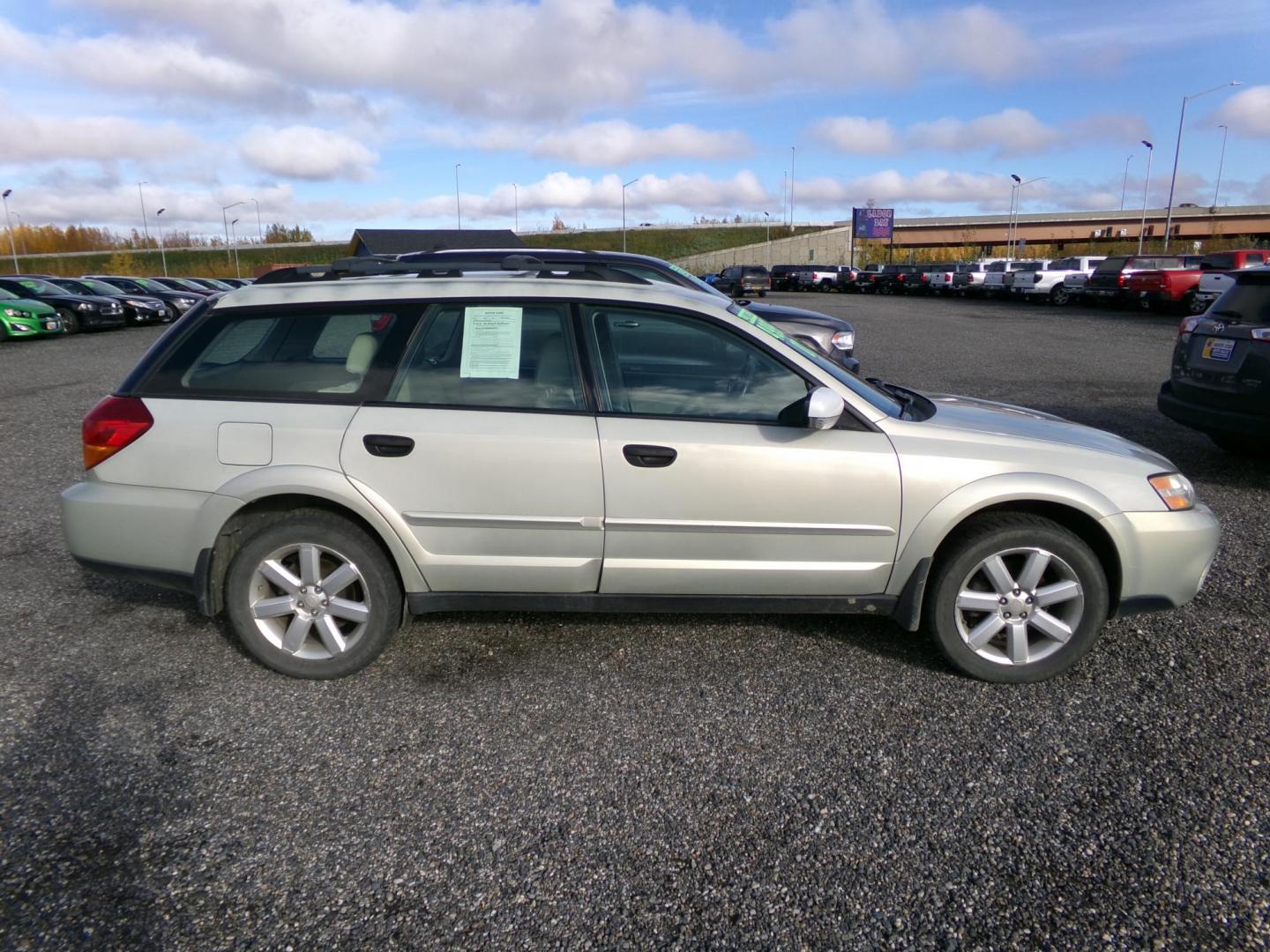 2007 Gold Subaru Outback 2.5i Basic Wagon (4S4BP61C377) with an 2.5L H4 SOHC 16V engine, 4-Speed Automatic Overdrive transmission, located at 2630 Philips Field Rd., Fairbanks, AK, 99709, (907) 458-0593, 64.848068, -147.780609 - Photo#2