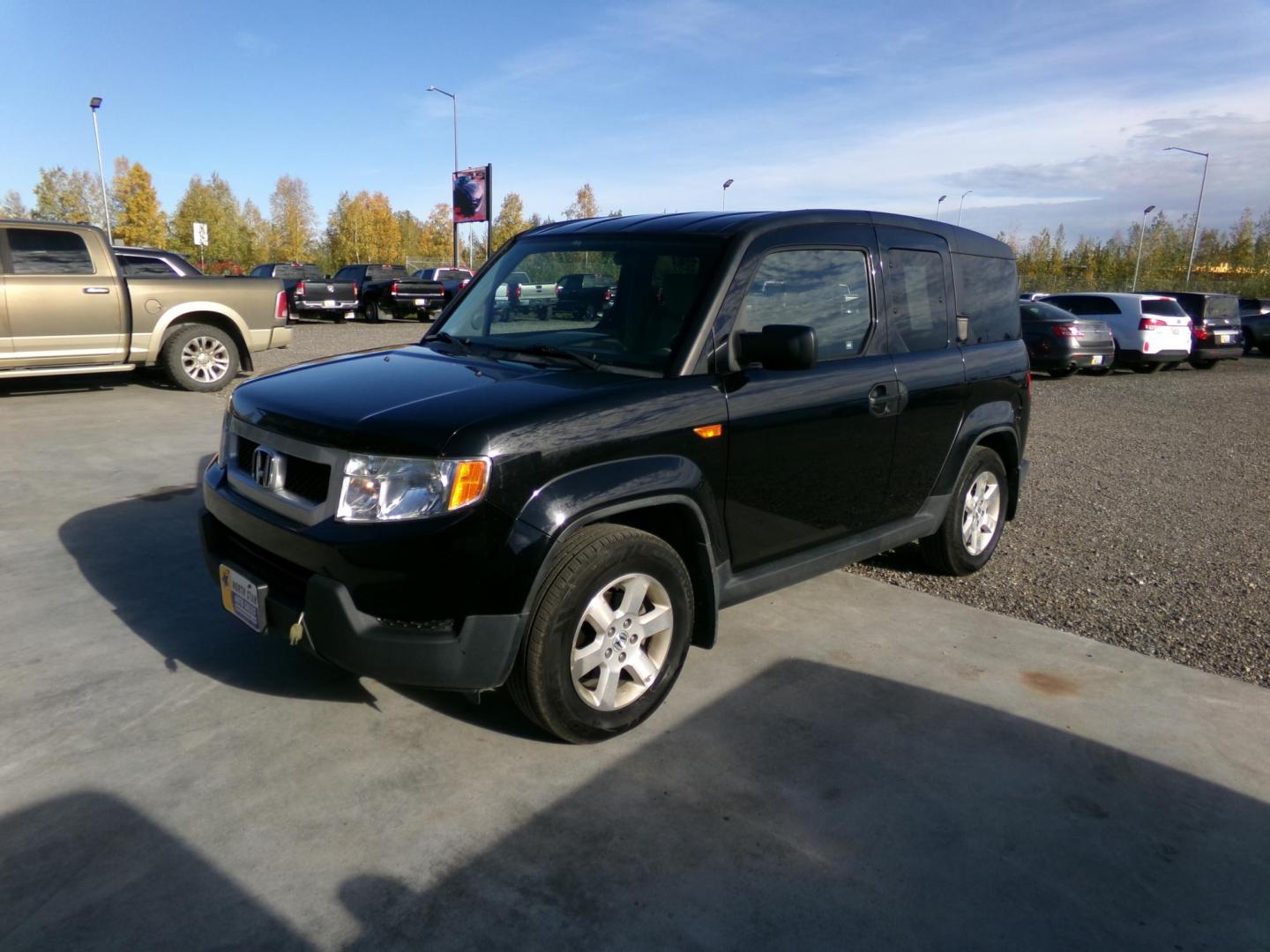 2011 Black Honda Element EX 4WD AT (5J6YH2H7XBL) with an 2.4L L4 DOHC 16V engine, 5-Speed Automatic transmission, located at 2630 Philips Field Rd., Fairbanks, AK, 99709, (907) 458-0593, 64.848068, -147.780609 - Photo#0