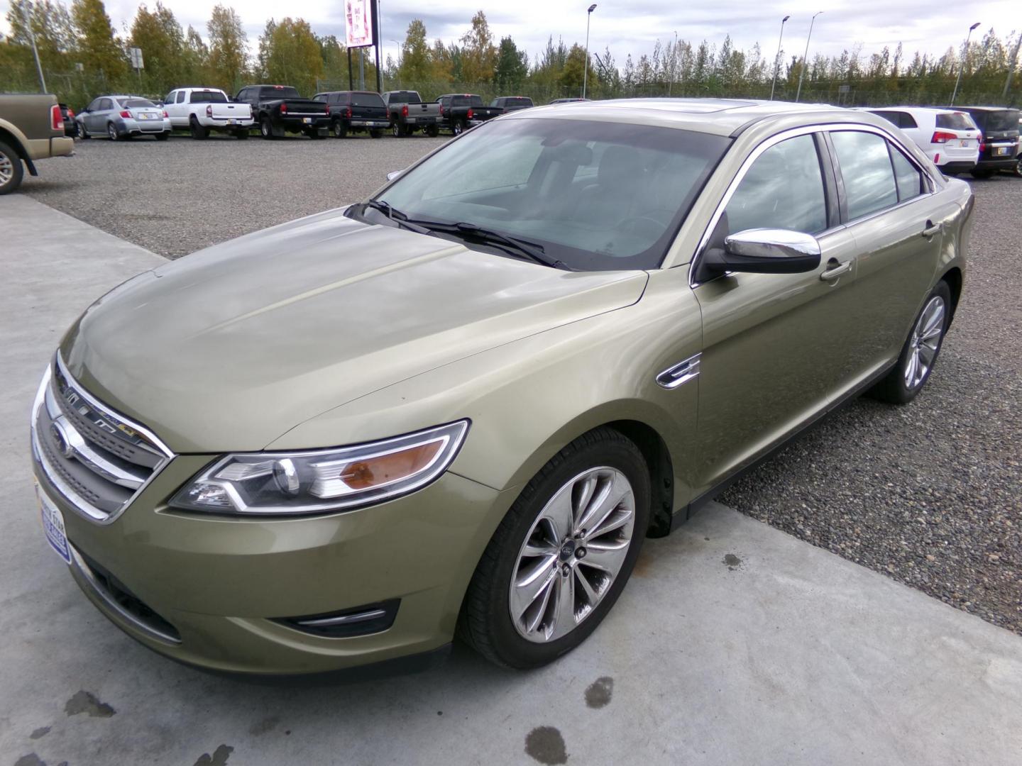 2012 Green Ford Taurus Limited AWD (1FAHP2JW8CG) with an 3.5L V6 DOHC 24V engine, 6-Speed Automatic transmission, located at 2630 Philips Field Rd., Fairbanks, AK, 99709, (907) 458-0593, 64.848068, -147.780609 - Photo#0