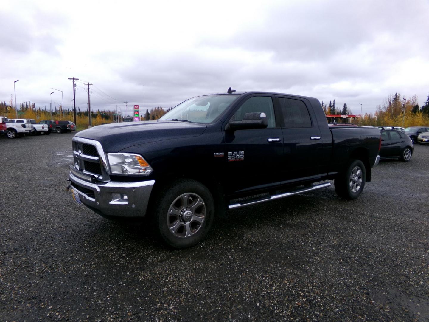 2016 Blue /Black Dodge 3500 SLT Mega Cab 4WD (3C63R3LJ6GG) with an 6.4L V8 OHV 16V engine, 6A transmission, located at 2630 Philips Field Rd., Fairbanks, AK, 99709, (907) 458-0593, 64.848068, -147.780609 - Photo#0