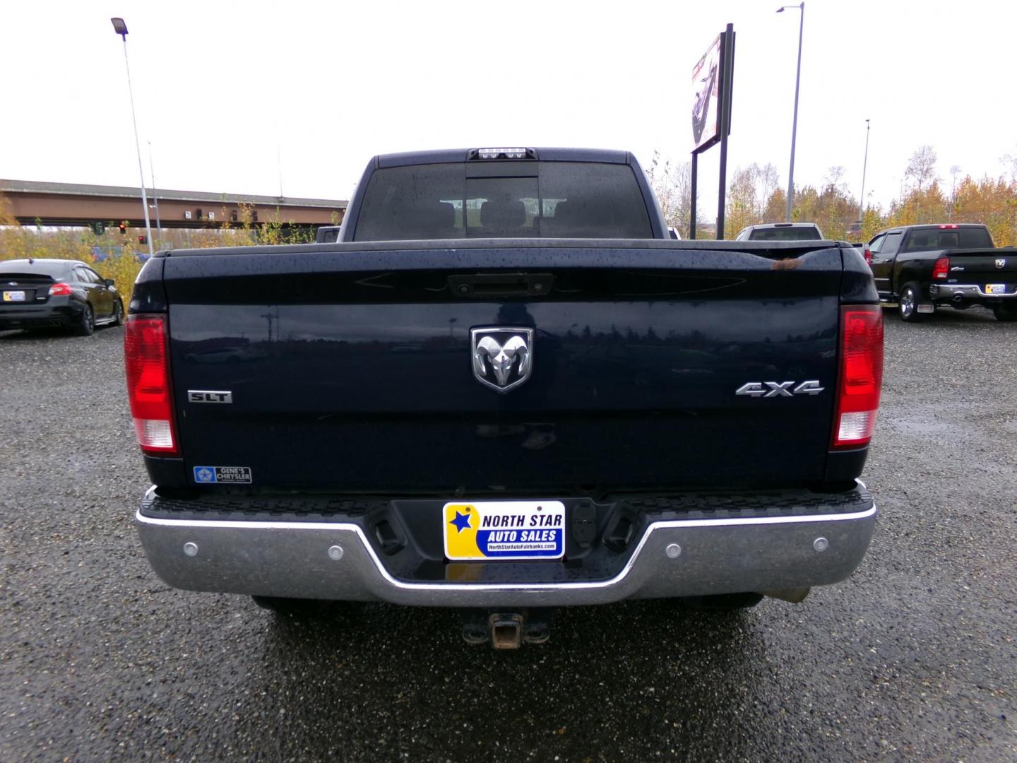 2016 Blue /Black Dodge 3500 SLT Mega Cab 4WD (3C63R3LJ6GG) with an 6.4L V8 OHV 16V engine, 6A transmission, located at 2630 Philips Field Rd., Fairbanks, AK, 99709, (907) 458-0593, 64.848068, -147.780609 - Photo#2