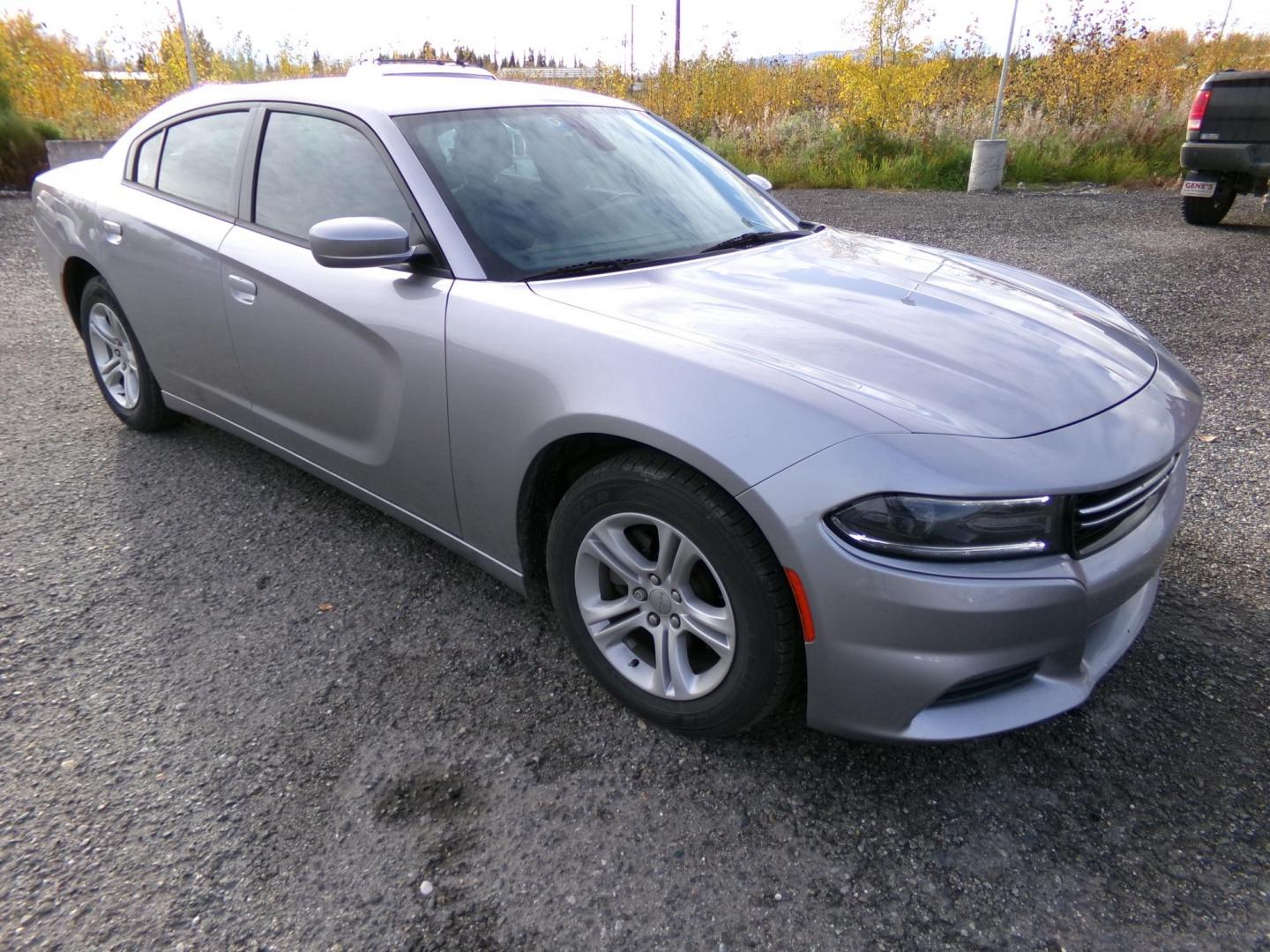 2015 Silver Dodge Charger SE (2C3CDXBG4FH) with an 3.6L V6 DOHC 24V engine, 8-Speed Automatic transmission, located at 2630 Philips Field Rd., Fairbanks, AK, 99709, (907) 458-0593, 64.848068, -147.780609 - Photo#0