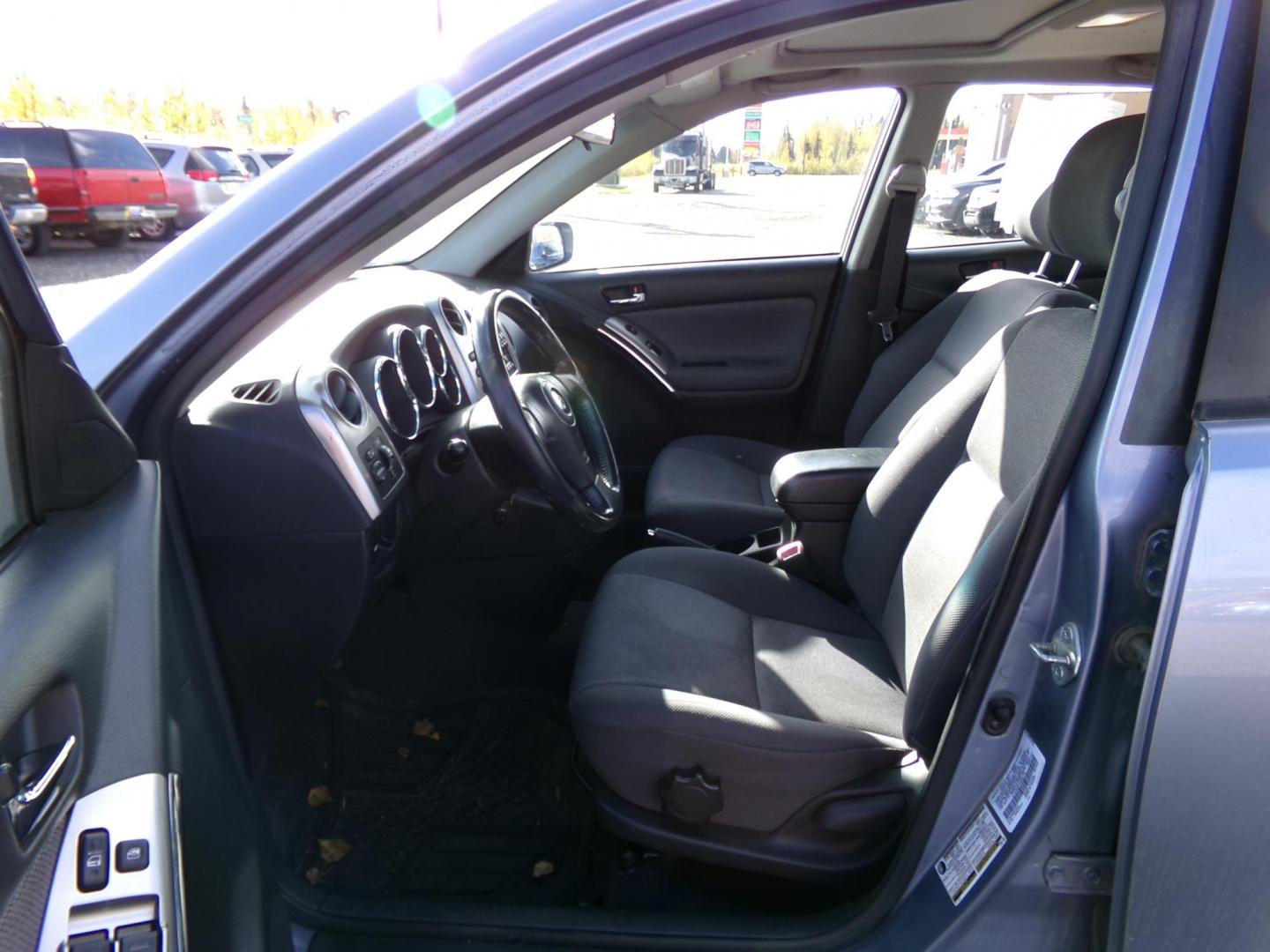 2004 Blue Toyota Matrix 4WD (2T1LR32E14C) with an 1.8L L4 DOHC 16V engine, 4-Speed Automatic Overdrive transmission, located at 2630 Philips Field Rd., Fairbanks, AK, 99709, (907) 458-0593, 64.848068, -147.780609 - Photo#6