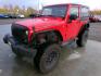 2018 Red Jeep Wrangler Rubicon 4WD (1C4BJWCG5JL) with an 3.6L V6 DOHC 24V FFV engine, located at 2630 Philips Field Rd., Fairbanks, AK, 99709, (907) 458-0593, 64.848068, -147.780609 - Photo#0