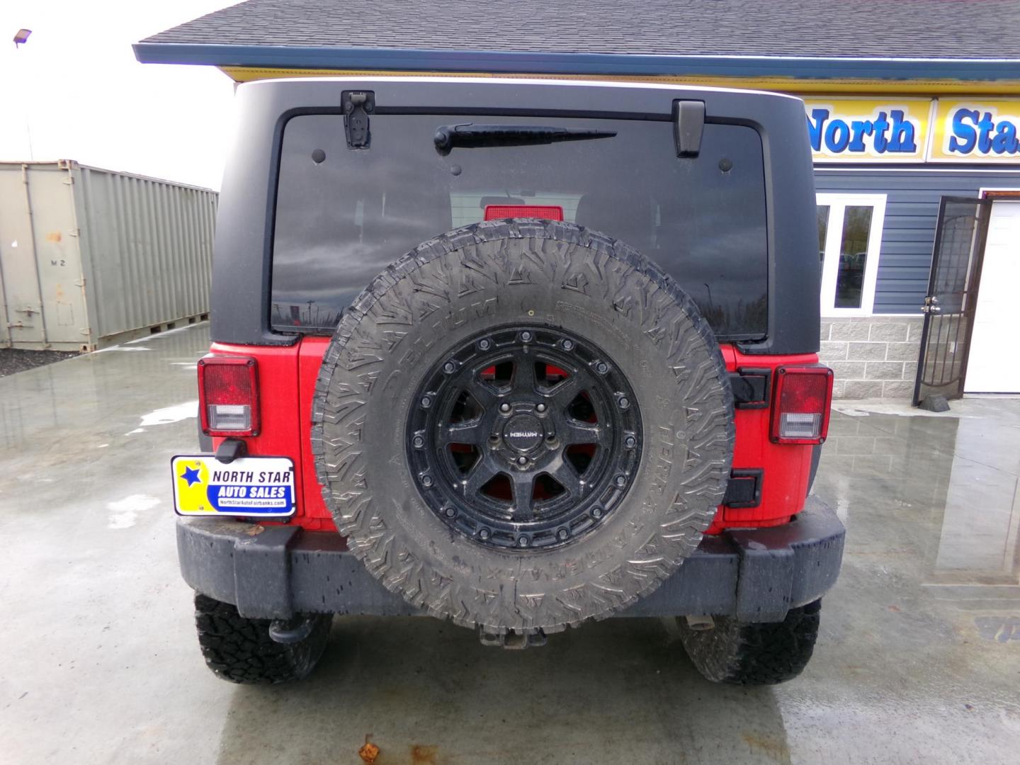 2018 Red Jeep Wrangler Rubicon 4WD (1C4BJWCG5JL) with an 3.6L V6 DOHC 24V FFV engine, located at 2630 Philips Field Rd., Fairbanks, AK, 99709, (907) 458-0593, 64.848068, -147.780609 - Photo#3