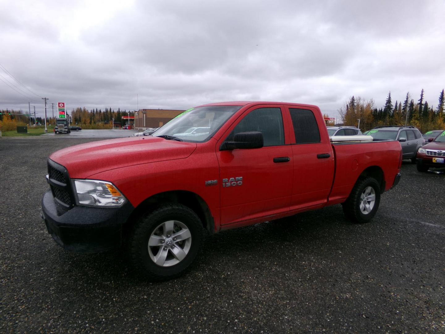 2018 Red Dodge 1500 Tradesman Quad Cab 4WD (1C6RR7FT4JS) with an 5.7L V8 OHV 16V engine, 8A transmission, located at 2630 Philips Field Rd., Fairbanks, AK, 99709, (907) 458-0593, 64.848068, -147.780609 - Photo#0