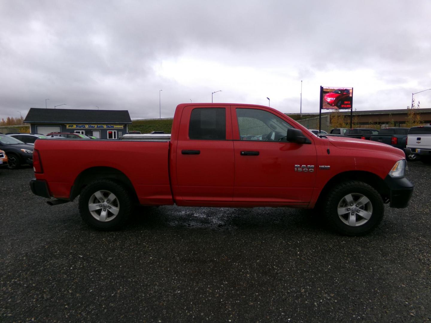 2018 Red Dodge 1500 Tradesman Quad Cab 4WD (1C6RR7FT4JS) with an 5.7L V8 OHV 16V engine, 8A transmission, located at 2630 Philips Field Rd., Fairbanks, AK, 99709, (907) 458-0593, 64.848068, -147.780609 - Photo#5