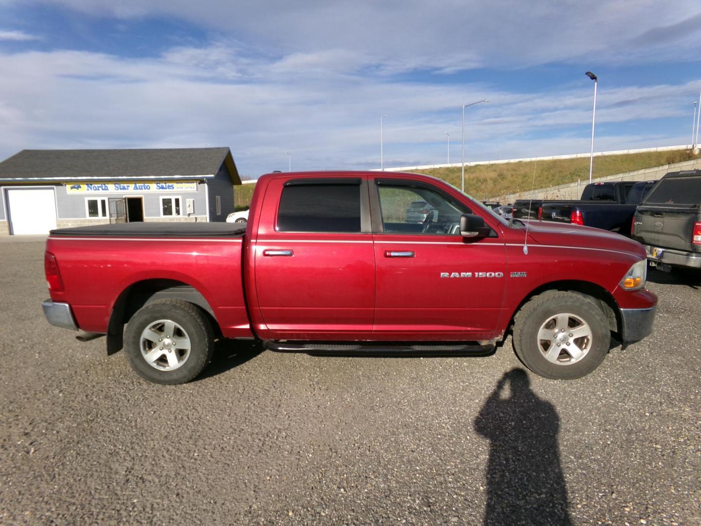 2011 Maroon /Black Dodge Ram 1500 ST Crew Cab 4WD (1D7RV1CT9BS) with an 5.7L V8 OHV 16V engine, 5-Speed Automatic transmission, located at 2630 Philips Field Rd., Fairbanks, AK, 99709, (907) 458-0593, 64.848068, -147.780609 - Photo#2