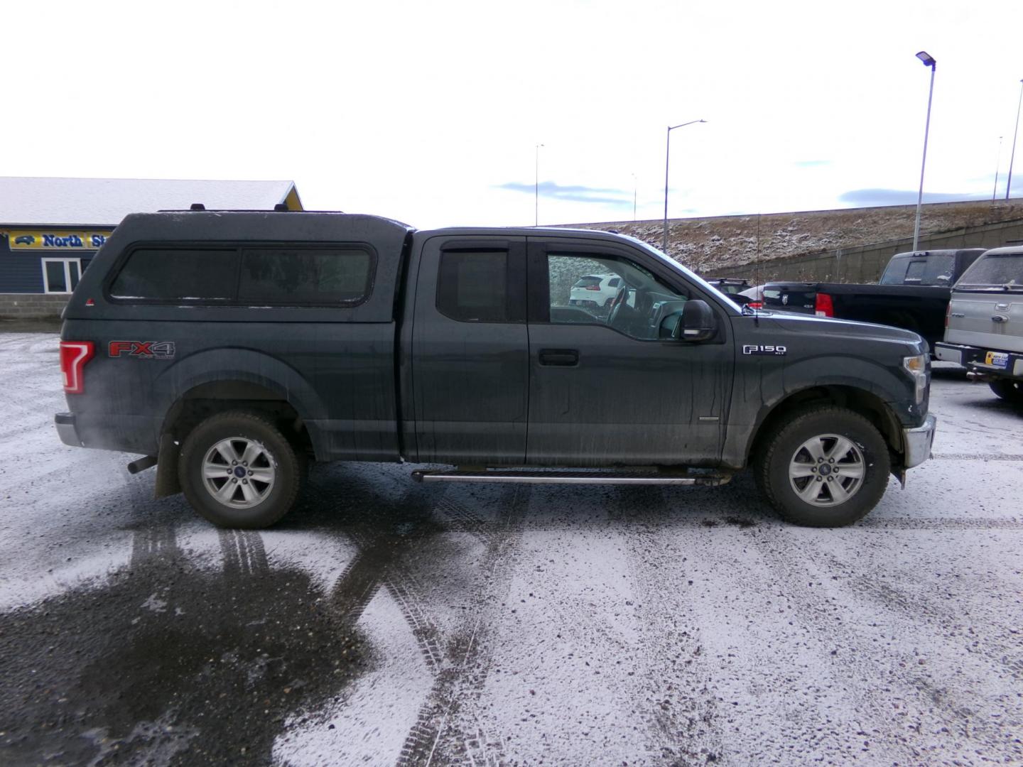 2015 Green Ford F-150 Lariat SuperCab 6.5-ft. Bed 4WD (1FTFX1EG3FK) with an 3.5L V6 DOHC 24V engine, 6-Speed Automatic transmission, located at 2630 Philips Field Rd., Fairbanks, AK, 99709, (907) 458-0593, 64.848068, -147.780609 - Photo#2