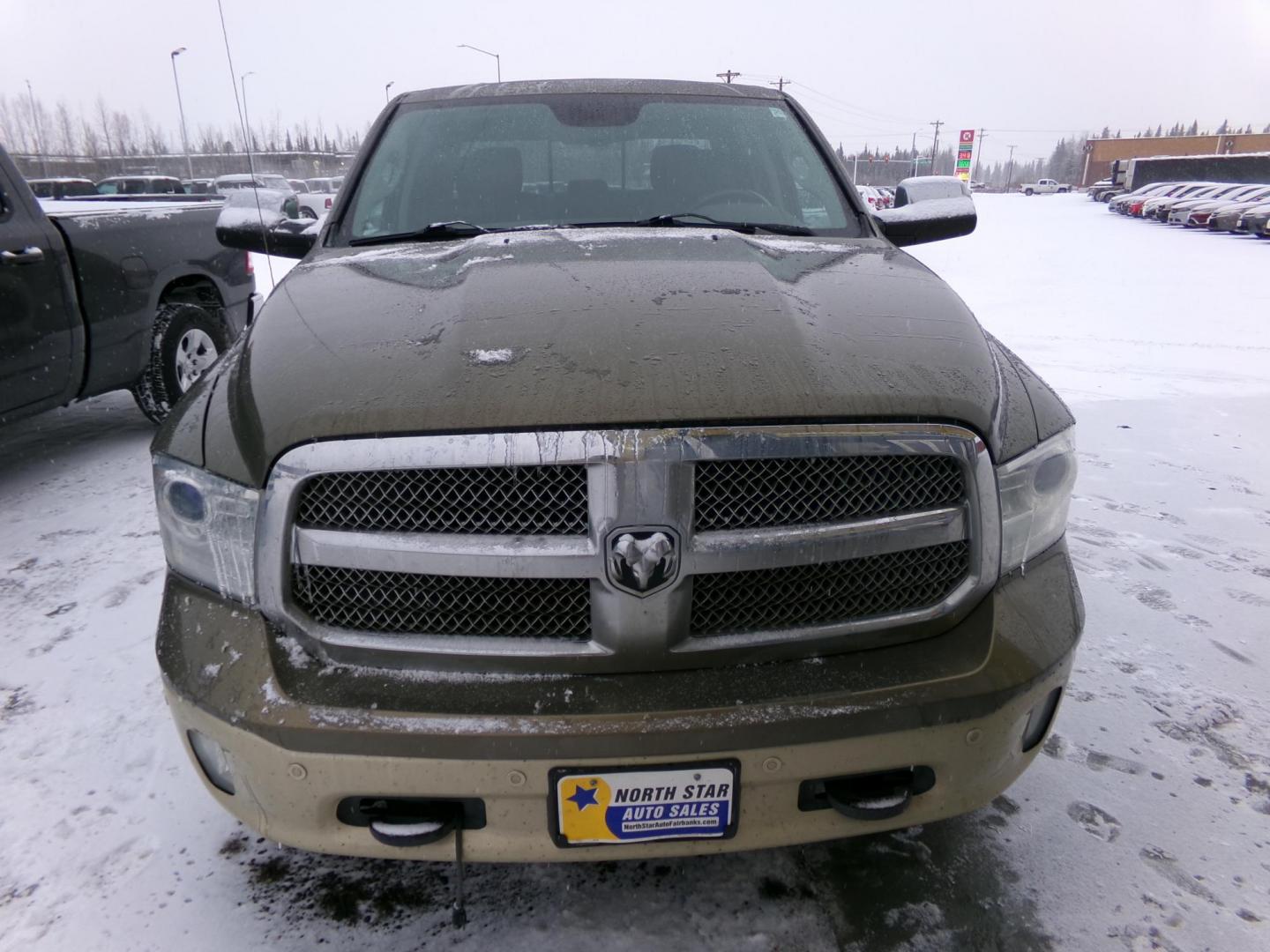 2015 Brown Dodge 1500 Longhorn Crew Cab SWB 4WD (1C6RR7PT9FS) with an 5.7L V8 OHV 16V engine, 6-Speed Automatic transmission, located at 2630 Philips Field Rd., Fairbanks, AK, 99709, (907) 458-0593, 64.848068, -147.780609 - Photo#1