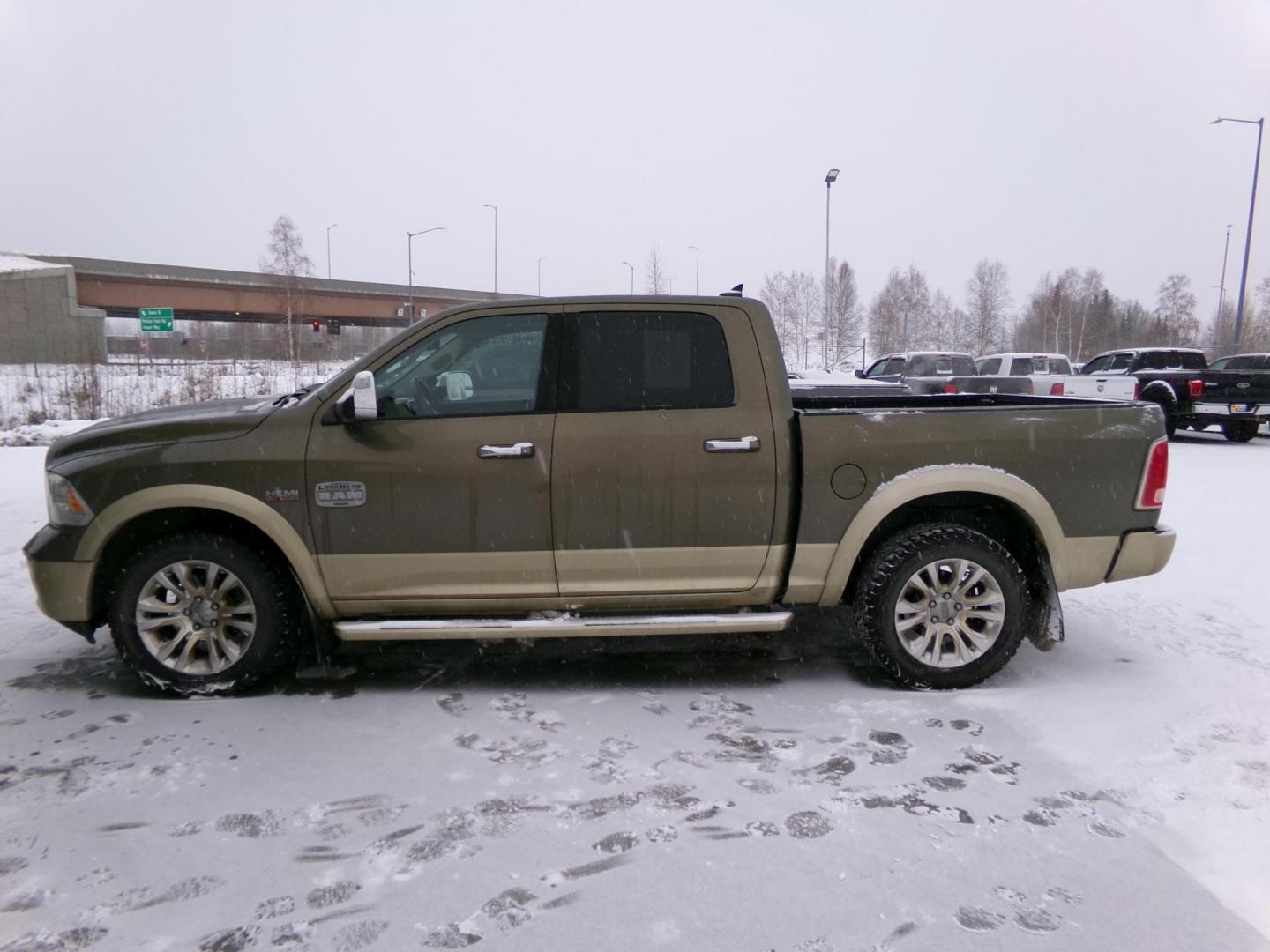 2015 Brown Dodge 1500 Longhorn Crew Cab SWB 4WD (1C6RR7PT9FS) with an 5.7L V8 OHV 16V engine, 6-Speed Automatic transmission, located at 2630 Philips Field Rd., Fairbanks, AK, 99709, (907) 458-0593, 64.848068, -147.780609 - Photo#2