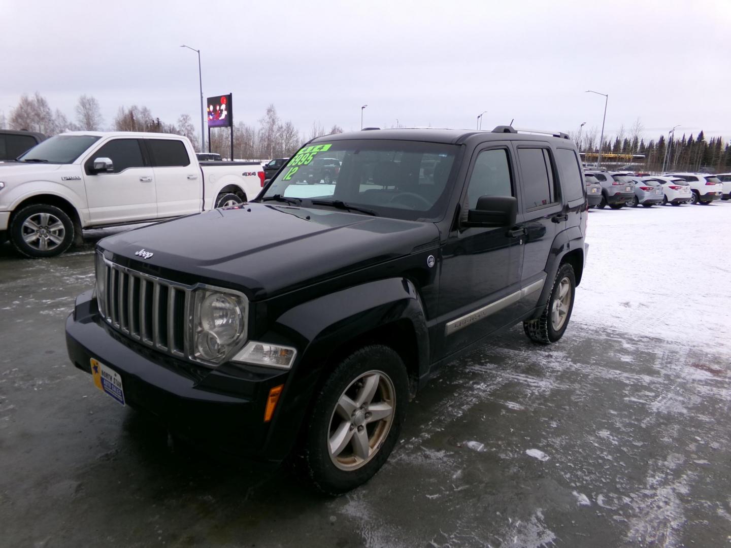 2012 Black Jeep Liberty Limited 4WD (1C4PJMCK6CW) with an 3.7L V6 SOHC 12V engine, 4-Speed Automatic transmission, located at 2630 Philips Field Rd., Fairbanks, AK, 99709, (907) 458-0593, 64.848068, -147.780609 - Photo#0