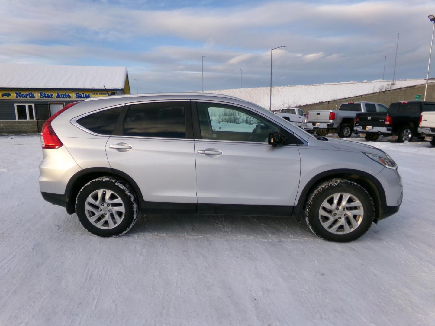 2018 Orange Honda CR-V EX-L AWD (2HKRW2H88JH) with an 2.4L L4 DOHC 16V engine, CVT transmission, located at 2630 Philips Field Rd., Fairbanks, AK, 99709, (907) 458-0593, 64.848068, -147.780609 - Photo#2