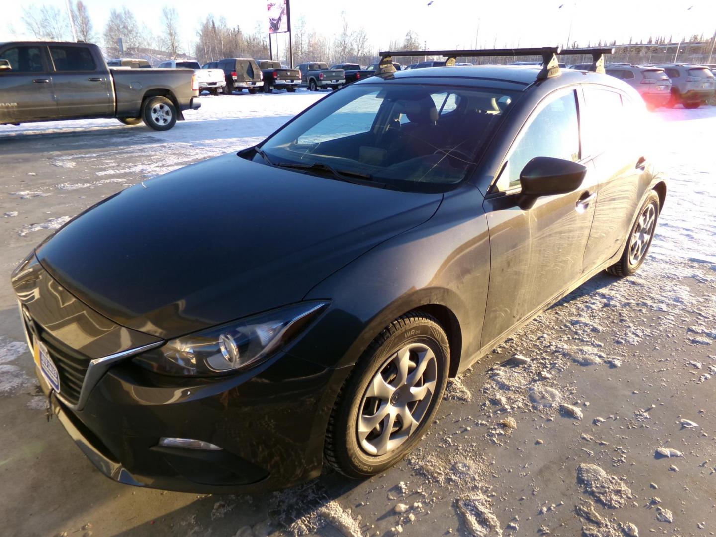 2016 Brown Mazda MAZDA3 i Sport AT 4-Door (JM1BM1J78G1) with an 2.0L L4 DOHC 16V engine, 6A transmission, located at 2630 Philips Field Rd., Fairbanks, AK, 99709, (907) 458-0593, 64.848068, -147.780609 - Photo#0