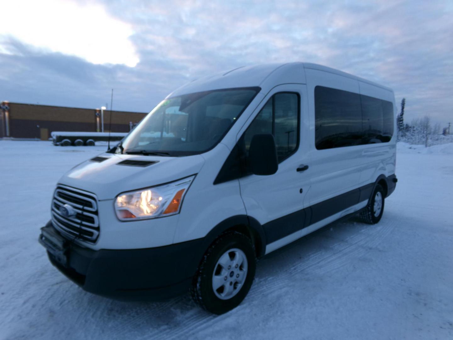 2017 White Ford Transit 350 Wagon Med. Roof XLT w/Sliding Pass. 148-in. WB (1FBAX2CMXHK) with an 3.7L V6 DOHC 24V engine, 6A transmission, located at 2630 Philips Field Rd., Fairbanks, AK, 99709, (907) 458-0593, 64.848068, -147.780609 - Photo#0