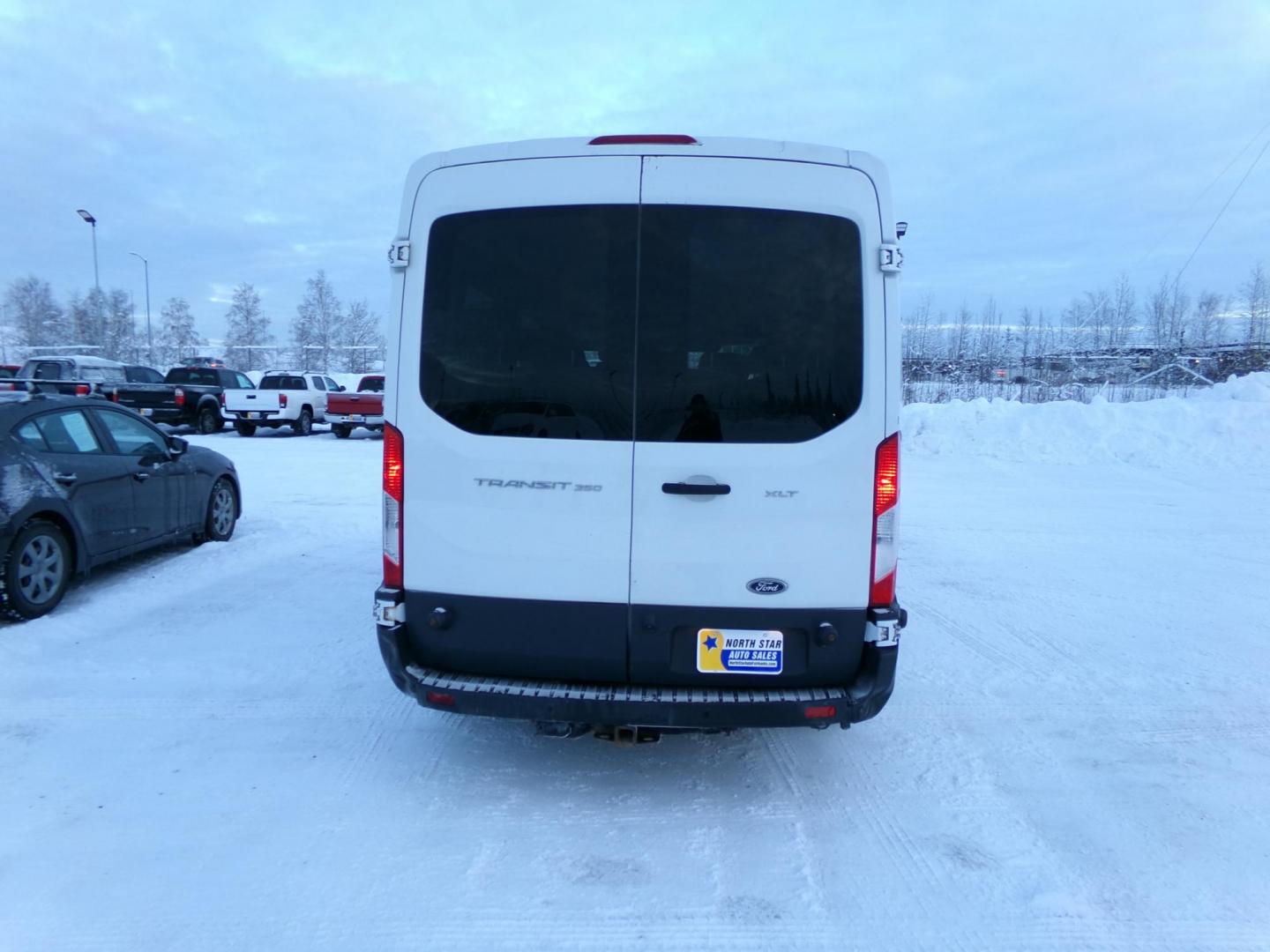 2017 White Ford Transit 350 Wagon Med. Roof XLT w/Sliding Pass. 148-in. WB (1FBAX2CMXHK) with an 3.7L V6 DOHC 24V engine, 6A transmission, located at 2630 Philips Field Rd., Fairbanks, AK, 99709, (907) 458-0593, 64.848068, -147.780609 - Photo#3