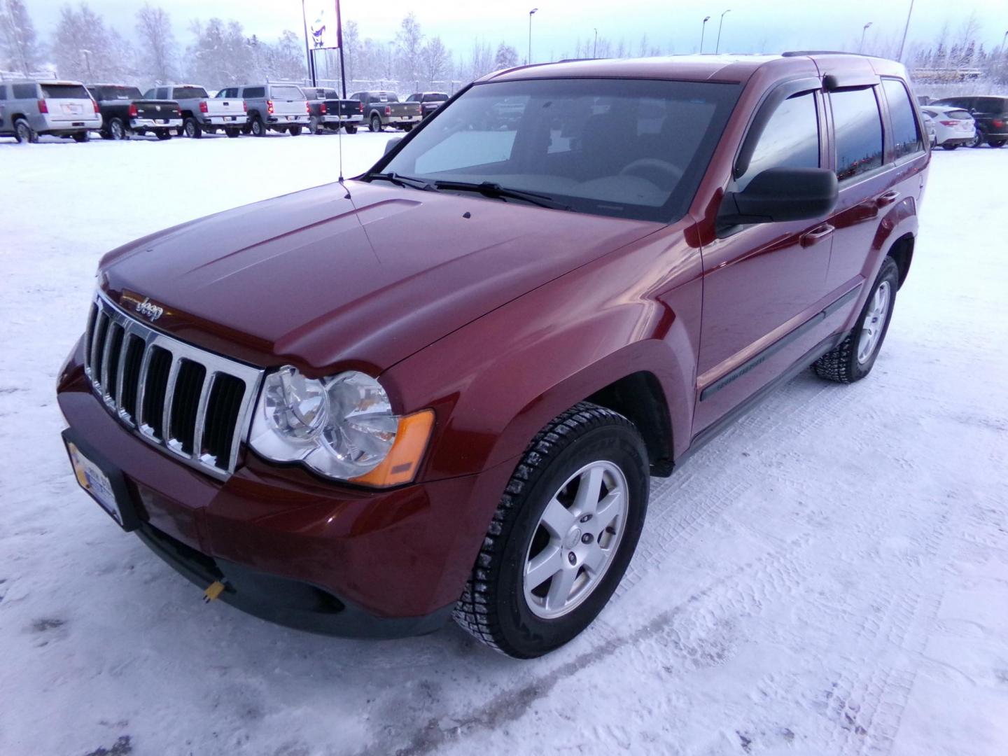 2008 Maroon Jeep Grand Cherokee Laredo 4WD (1J8GR48K38C) with an 3.7L V6 SOHC 12V engine, 5-Speed Automatic Overdrive transmission, located at 2630 Philips Field Rd., Fairbanks, AK, 99709, (907) 458-0593, 64.848068, -147.780609 - Photo#0