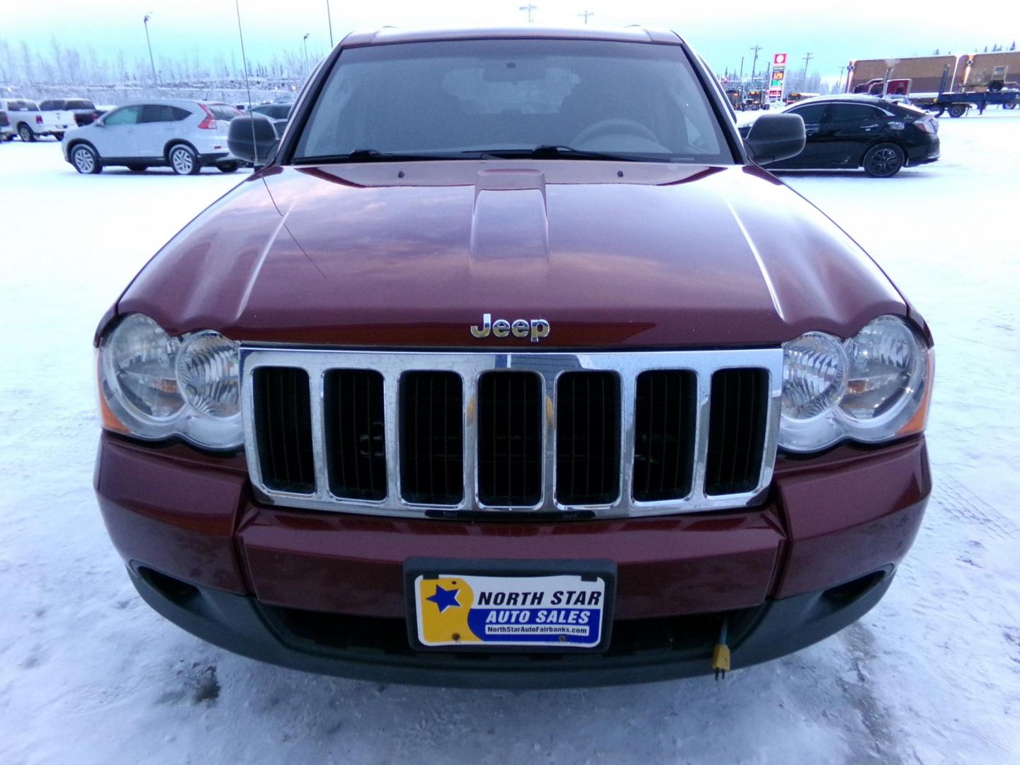 2008 Maroon Jeep Grand Cherokee Laredo 4WD (1J8GR48K38C) with an 3.7L V6 SOHC 12V engine, 5-Speed Automatic Overdrive transmission, located at 2630 Philips Field Rd., Fairbanks, AK, 99709, (907) 458-0593, 64.848068, -147.780609 - Photo#1