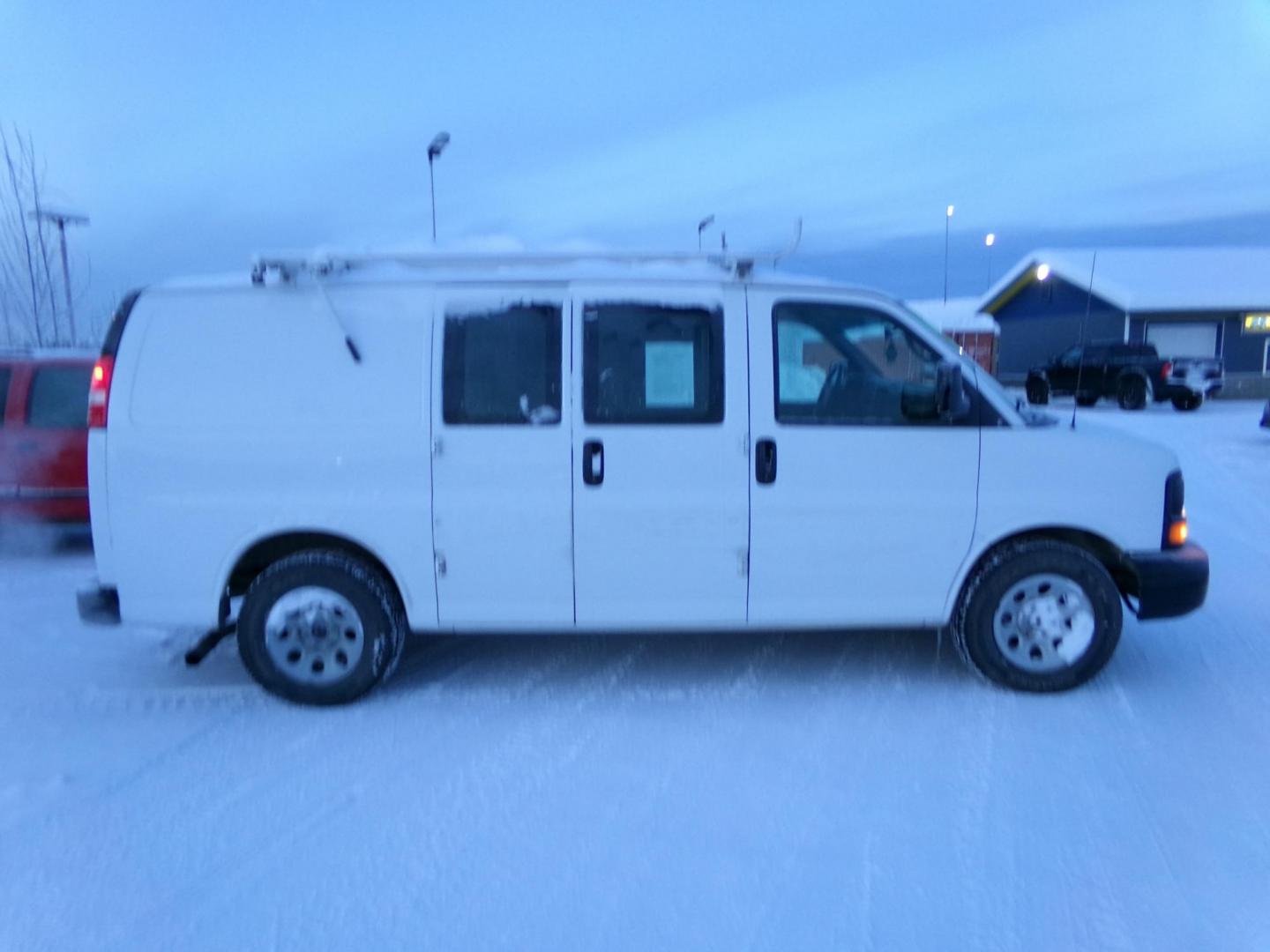 2013 White GMC Savana G1500 Cargo AWD (1GTS8AF41D1) with an 5.3L V8 OHV 16V engine, 4-Speed Automatic transmission, located at 2630 Philips Field Rd., Fairbanks, AK, 99709, (907) 458-0593, 64.848068, -147.780609 - Photo#2