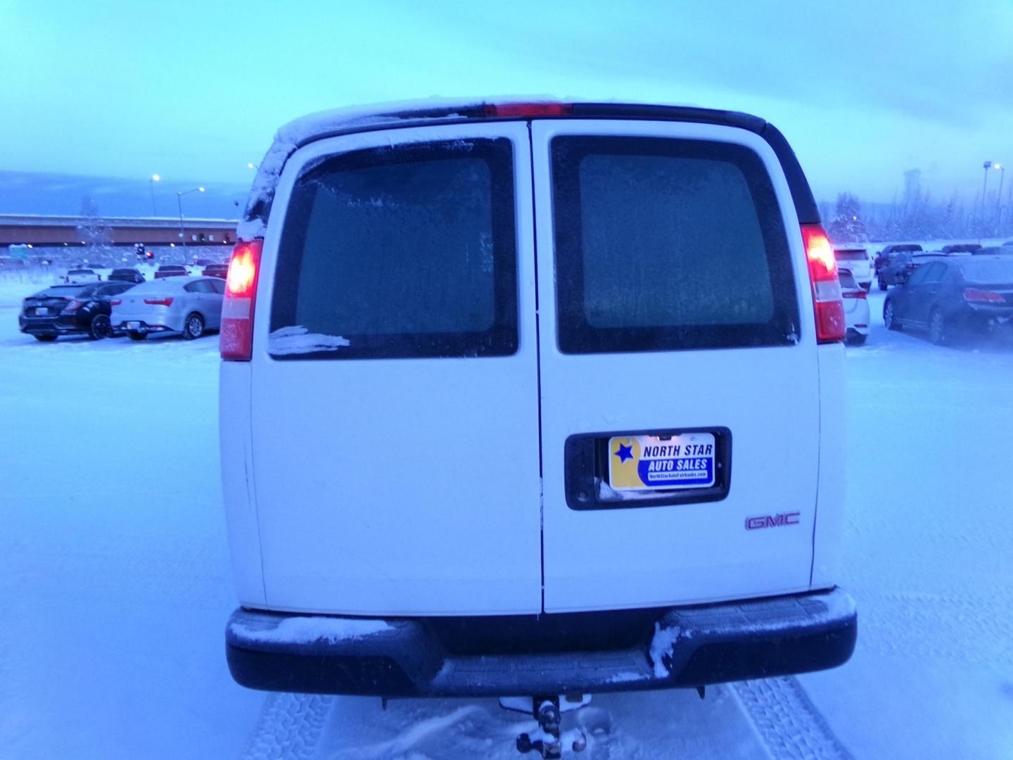 2013 White GMC Savana G1500 Cargo AWD (1GTS8AF41D1) with an 5.3L V8 OHV 16V engine, 4-Speed Automatic transmission, located at 2630 Philips Field Rd., Fairbanks, AK, 99709, (907) 458-0593, 64.848068, -147.780609 - Photo#3