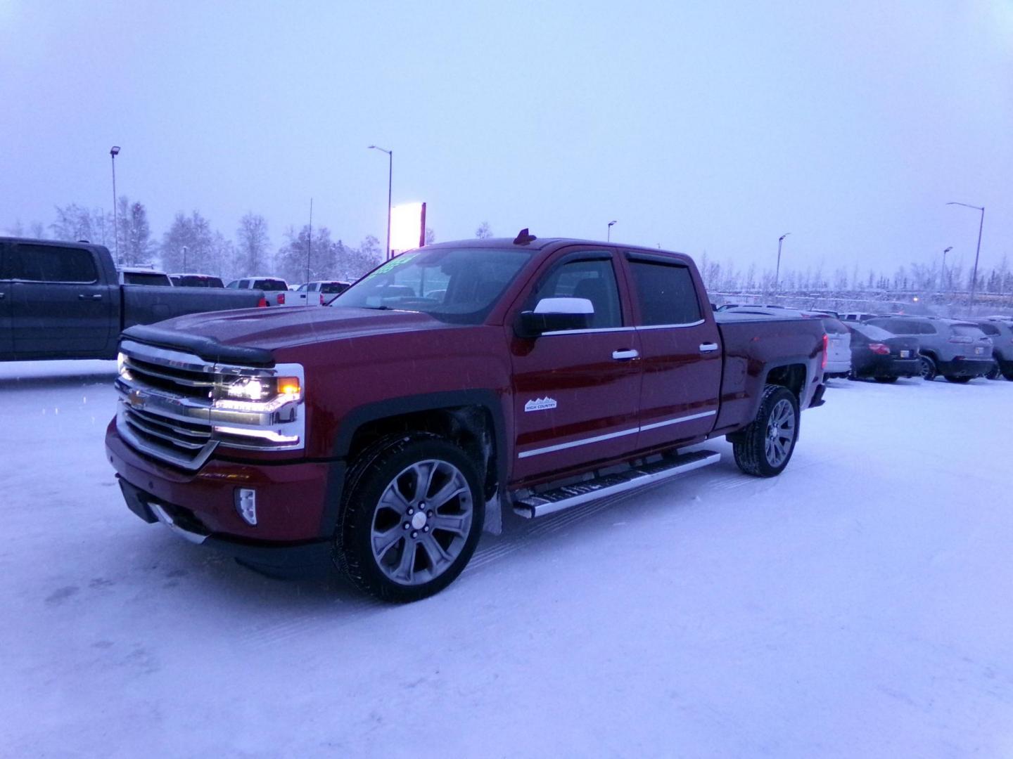 2017 Red /Black Chevrolet Silverado 1500 High Country Crew Cab Short Box 4WD (3GCUKTEJ8HG) with an 6.2L V8 OHV 16V engine, 6A transmission, located at 2630 Philips Field Rd., Fairbanks, AK, 99709, (907) 458-0593, 64.848068, -147.780609 - Photo#0