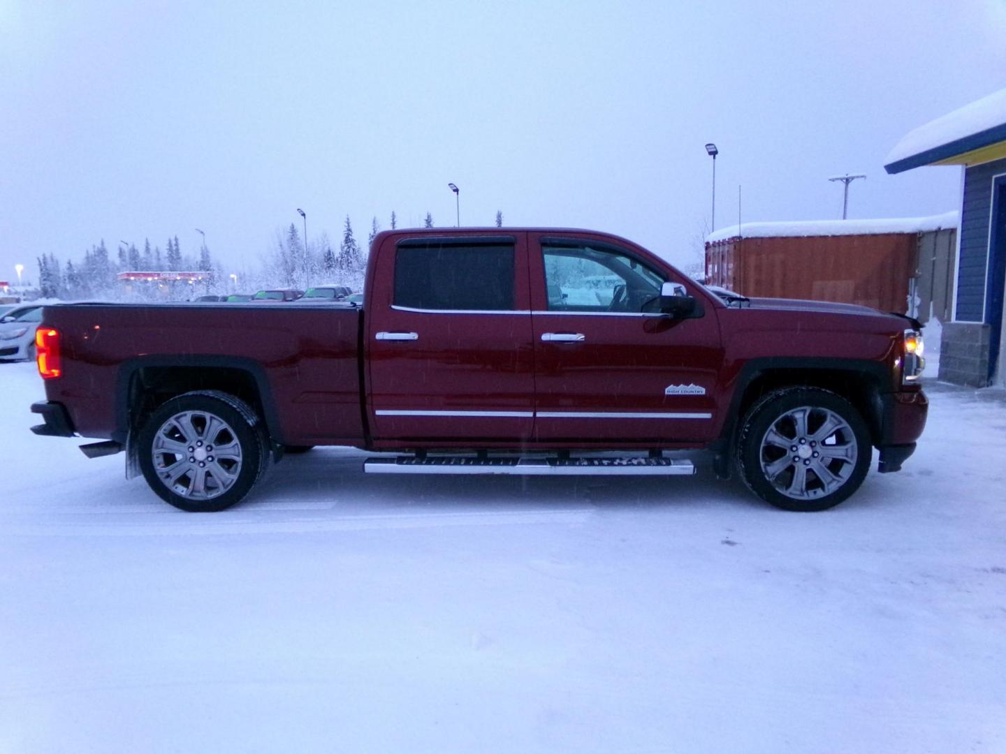 2017 Red /Black Chevrolet Silverado 1500 High Country Crew Cab Short Box 4WD (3GCUKTEJ8HG) with an 6.2L V8 OHV 16V engine, 6A transmission, located at 2630 Philips Field Rd., Fairbanks, AK, 99709, (907) 458-0593, 64.848068, -147.780609 - Photo#1