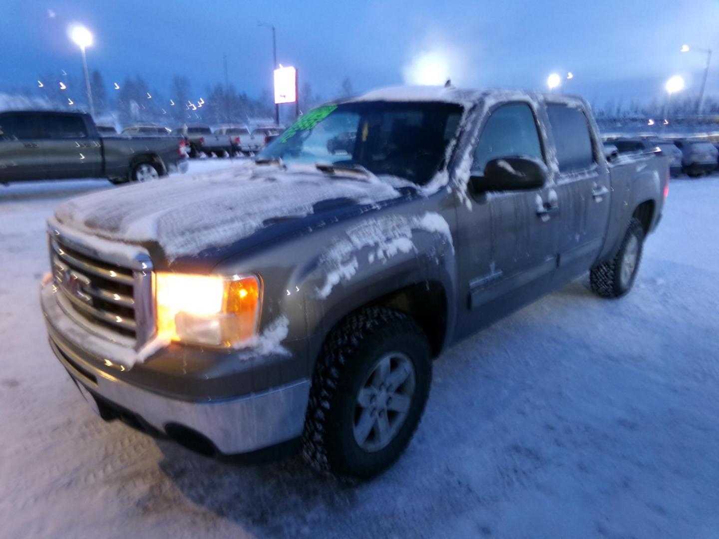 2012 Brown GMC Sierra 1500 SLE Crew Cab 4WD (3GTP2VE77CG) with an 5.3L V8 OHV 16V FFV engine, 6-Speed Automatic transmission, located at 2630 Philips Field Rd., Fairbanks, AK, 99709, (907) 458-0593, 64.848068, -147.780609 - Photo#0