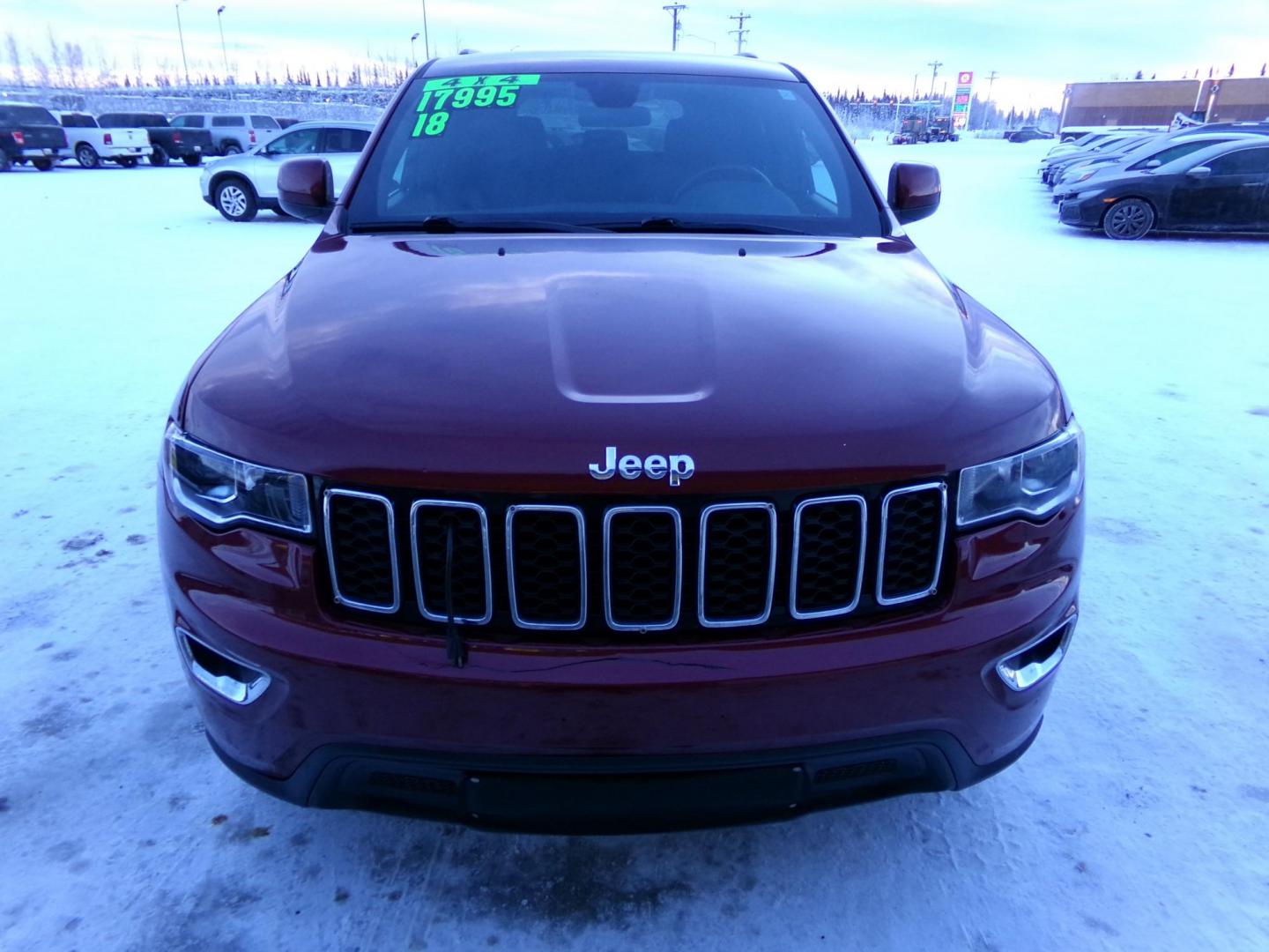 2018 Red Jeep Grand Cherokee Laredo 4WD (1C4RJFAG3JC) with an 3.6L V6 DOHC 24V engine, 8A transmission, located at 2630 Philips Field Rd., Fairbanks, AK, 99709, (907) 458-0593, 64.848068, -147.780609 - Photo#1