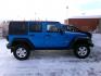 2014 Blue Jeep Wrangler Unlimited Sport 4WD (1C4BJWDG4EL) with an 3.6L V6 DOHC 24V FFV engine, located at 2630 Philips Field Rd., Fairbanks, AK, 99709, (907) 458-0593, 64.848068, -147.780609 - Photo#1