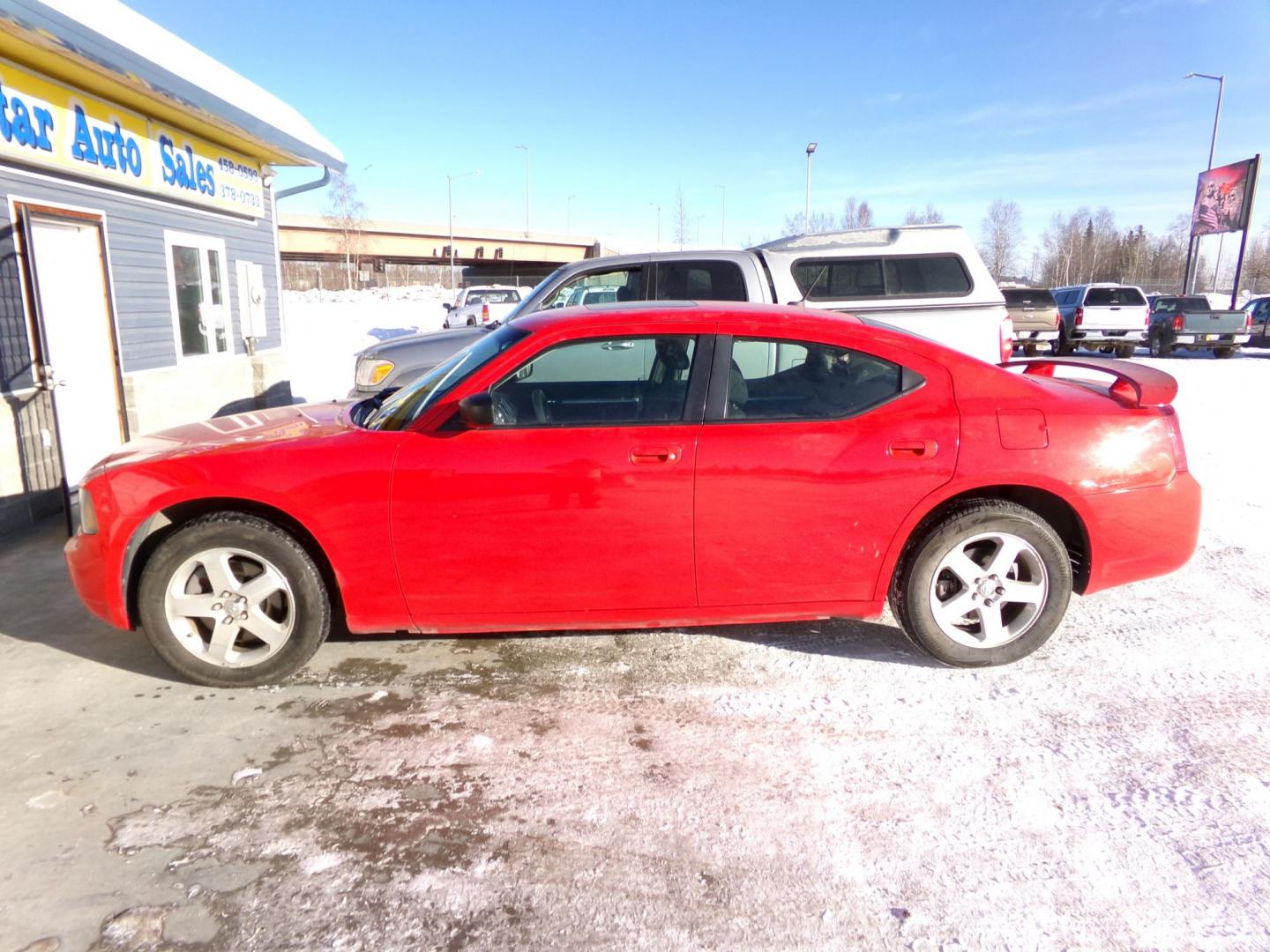 2008 Red Dodge Charger SXT AWD (2B3KK33GX8H) with an 3.5L V6 SOHC 24V engine, 5-Speed Automatic transmission, located at 2630 Philips Field Rd., Fairbanks, AK, 99709, (907) 458-0593, 64.848068, -147.780609 - Photo#2